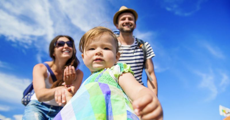 Child and parents at music festival