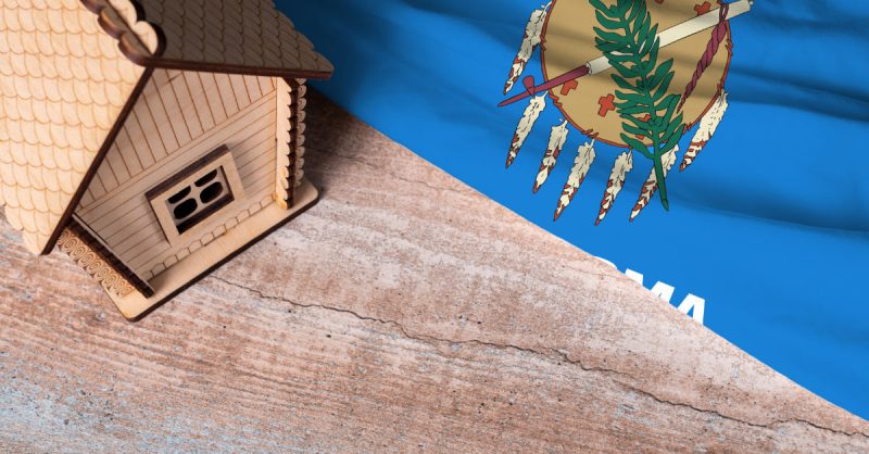 Move to Oklahoma graphic with model house and Oklahoma flag